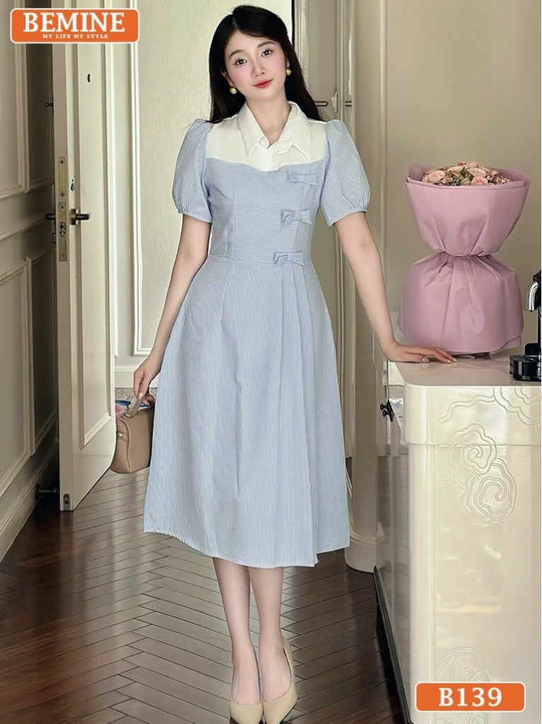 Mẫu váy xòe liền thân công sở đẹp với thiết kế cổ sơ mi phối nơ