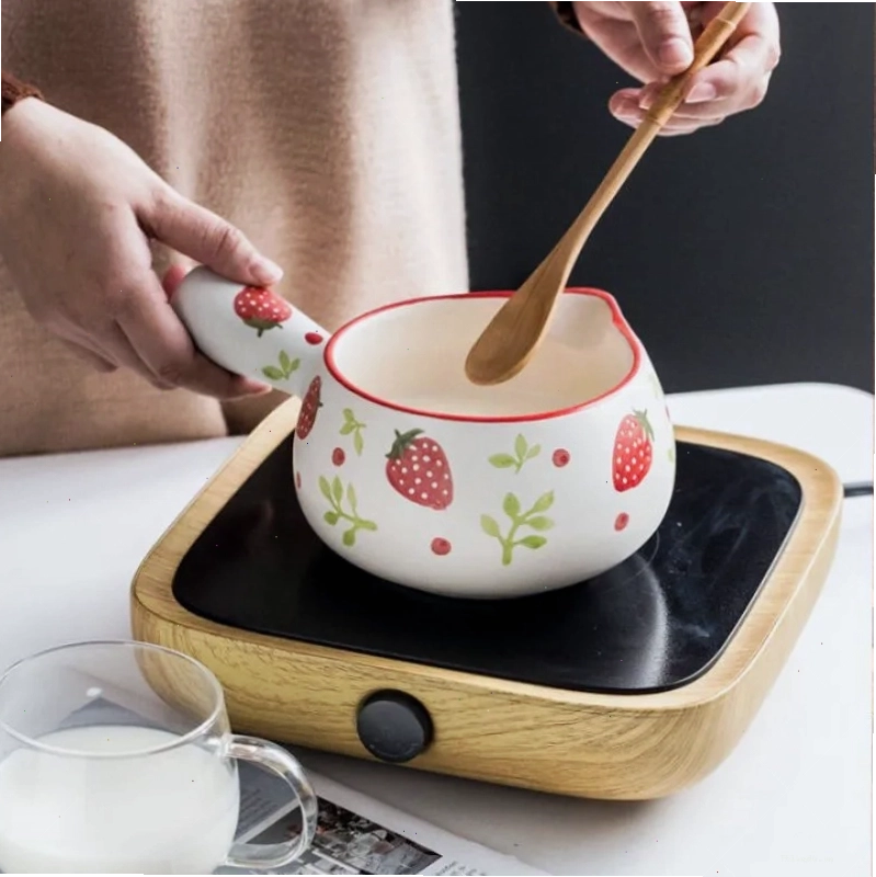 Nấu nước dùng bò nhúng dấm trên bếp
